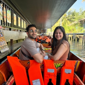 A couple enjoying a boat riding