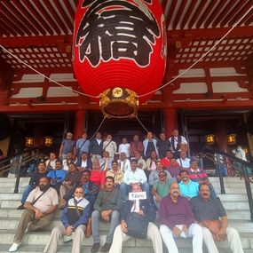 Tibro group enjoys a cultural visit to a historic temple.