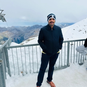 Man posing on a snowy mountain