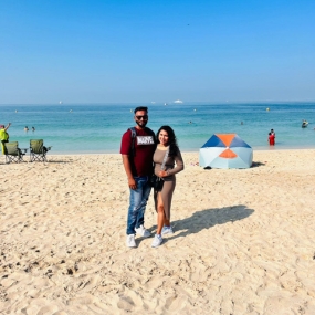 Couple clicking photo on a beach 